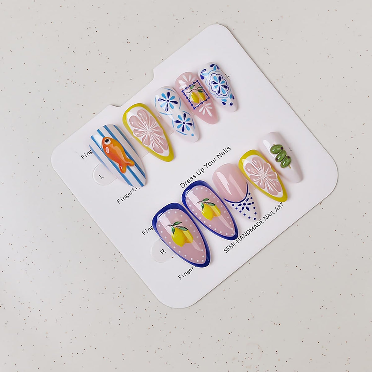 NZRAESTRS close-up of 3D fish and lemon nail details for playful texture
