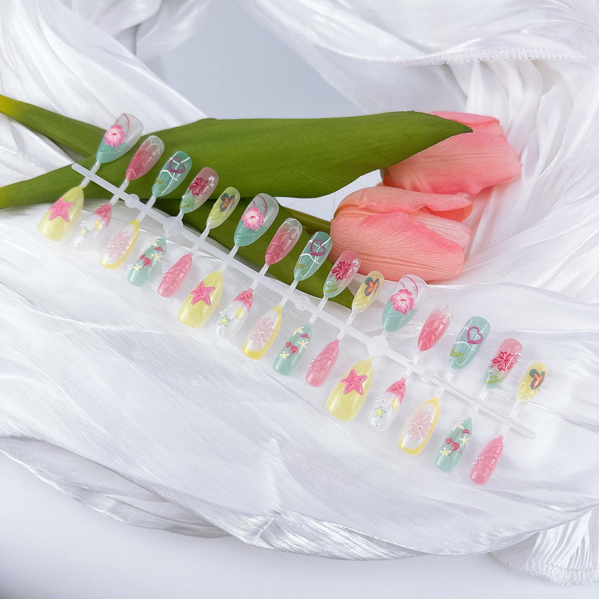 NZRAESTRS top view of medium almond nails showing shape and color for elegant wear