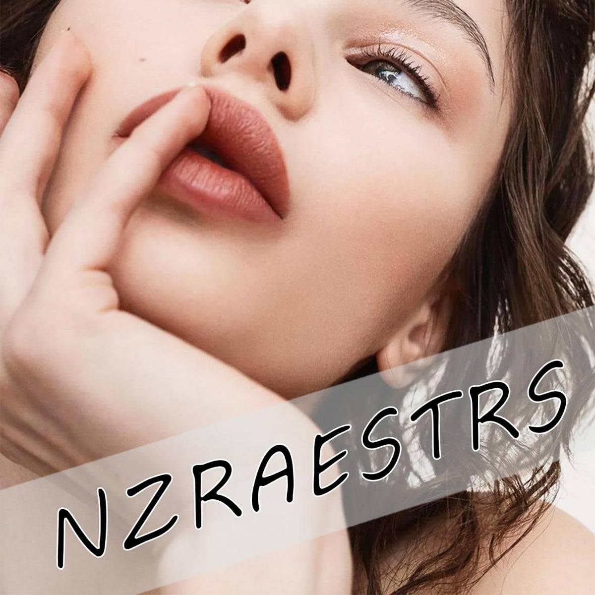 NZRAESTRS nails beside a ruler to show size comparison and fit guidance
