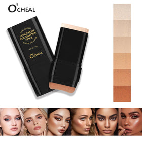 O'CHEAL foundation stick held in hand to show size and travel-friendly scale