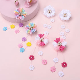 OAOLEER bows worn in ponytail and pigtail styles for neat, photo-ready looks