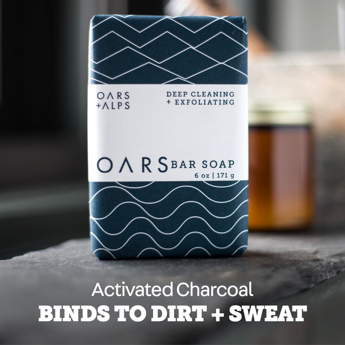 Oars + Alps volcanic sand and blue charcoal ingredients highlighting pore-clearing benefit