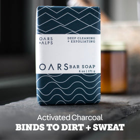 Oars + Alps volcanic sand and blue charcoal ingredients highlighting pore-clearing benefit