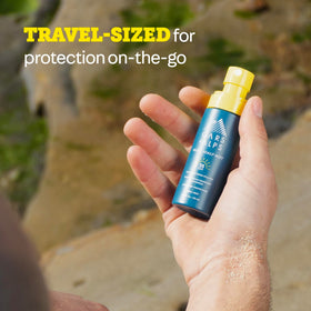 Oars + Alps spray inside a beach bag conveying on-the-go sun protection