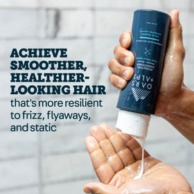 Oars + Alps shampoo lather close-up demonstrating gentle cleansing and rich hydration