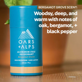 Oars + Alps stick in hand for scale showing compact 2.6oz size ideal for travel