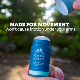Oars + Alps deodorant held in hand showing compact 2.6oz size