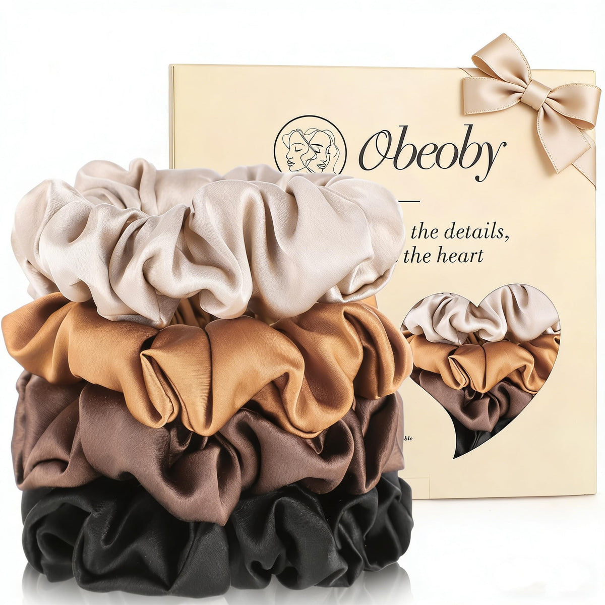 obeoby front packaging showing four silk scrunchies and neat arrangement, highlights quality