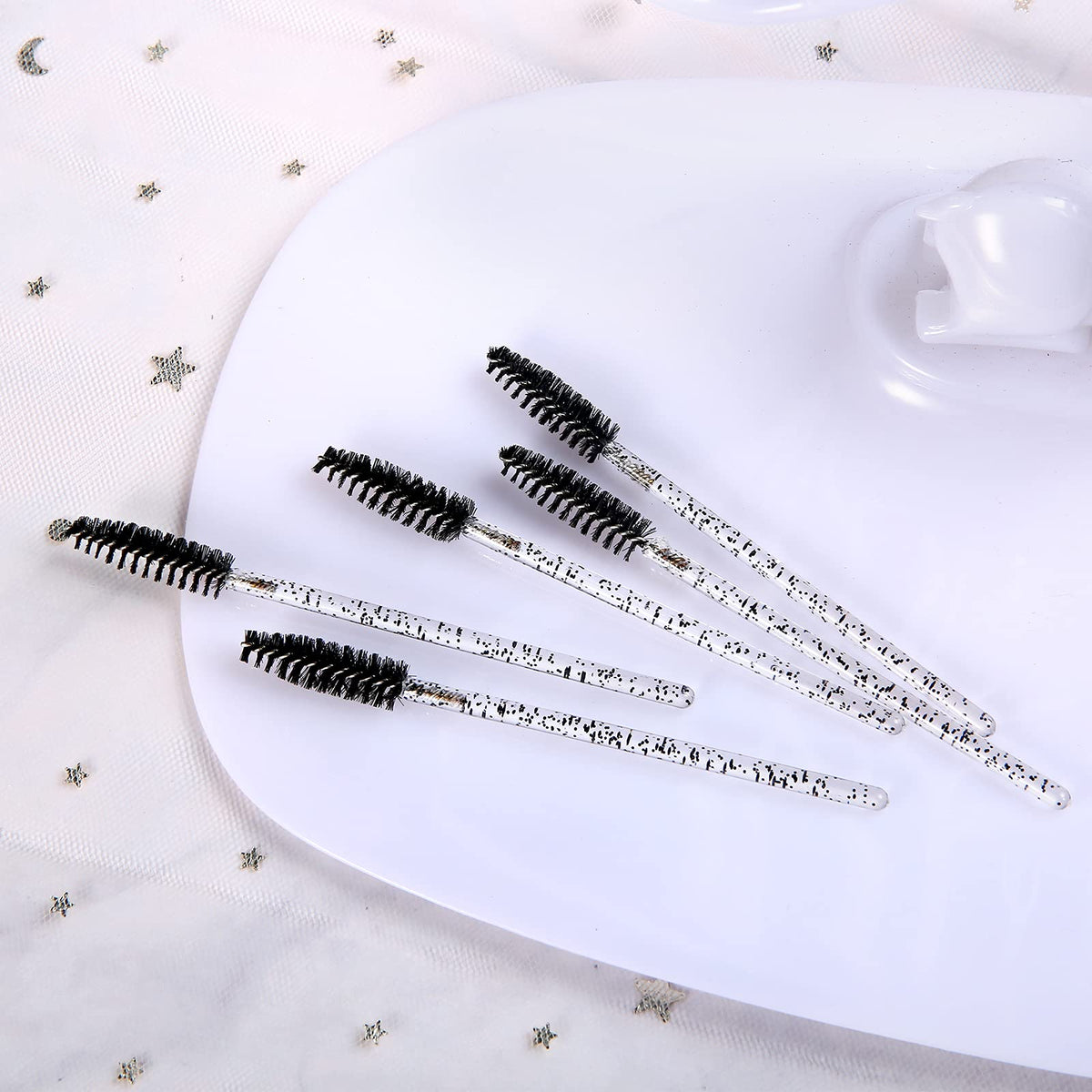 Obinhere spread of multiple wands illustrating ample quantity for salons