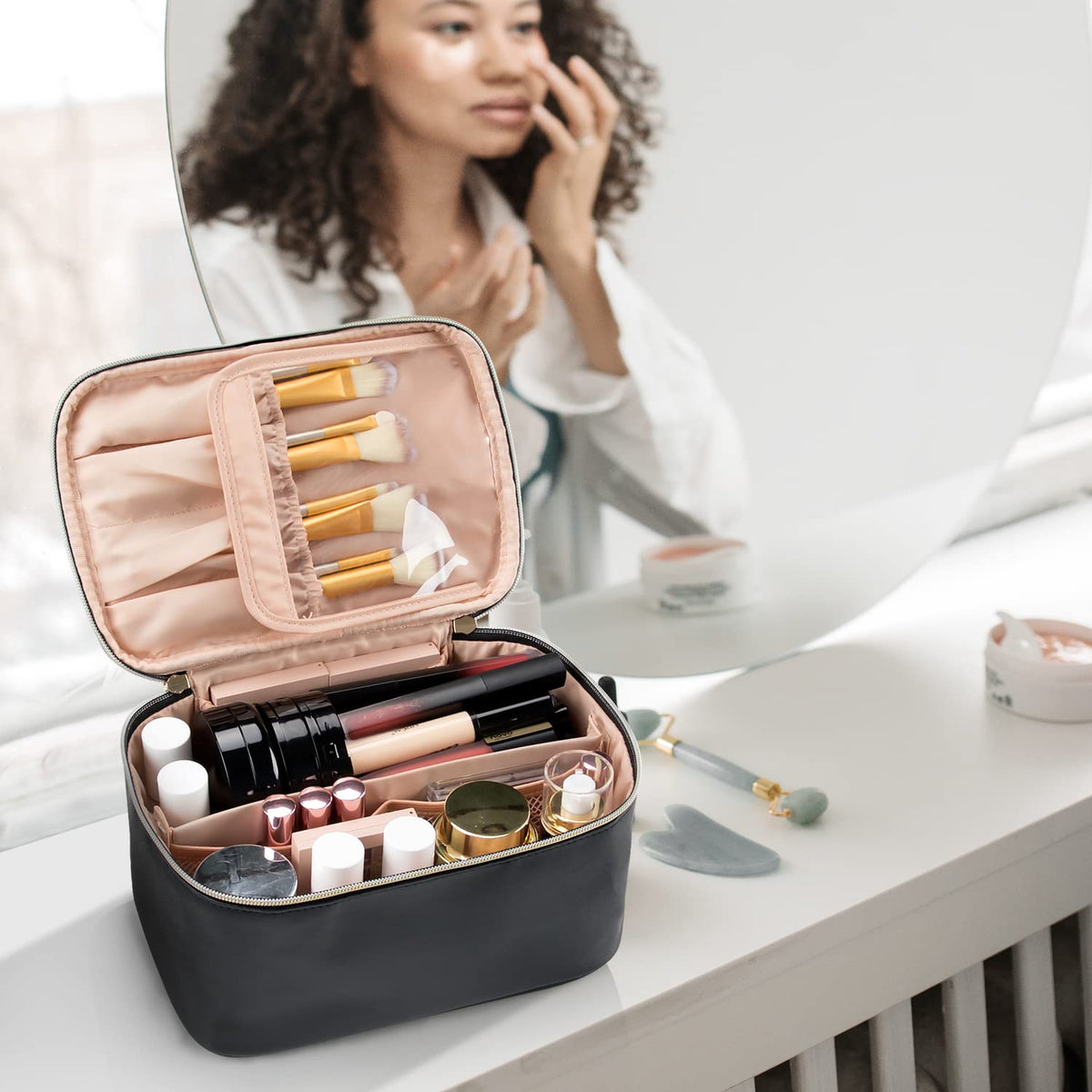 OCHEAL bag in a travel setting on a suitcase showing ready-to-pack convenience