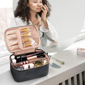 OCHEAL bag in a travel setting on a suitcase showing ready-to-pack convenience