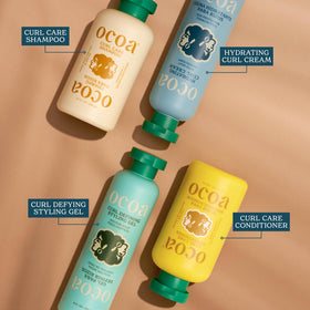 OCOA 10 fl oz bottle next to a hand for size and scale reference