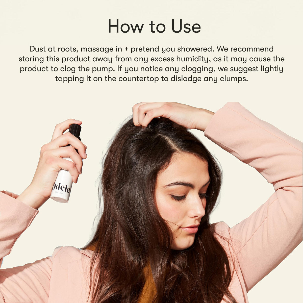 Odele powder blended into dark hair demonstrating invisible finish advantage