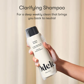 Odele shampoo pump and cap detail highlighting easy dispensing and convenience