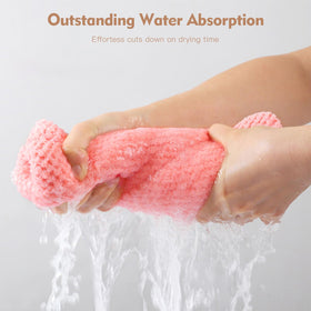 OEAGO towel beside hand showing size and scale for convenience while traveling