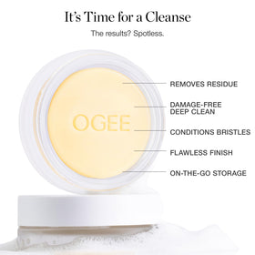 Ogee size comparison next to a brush, compact travel-ready benefit