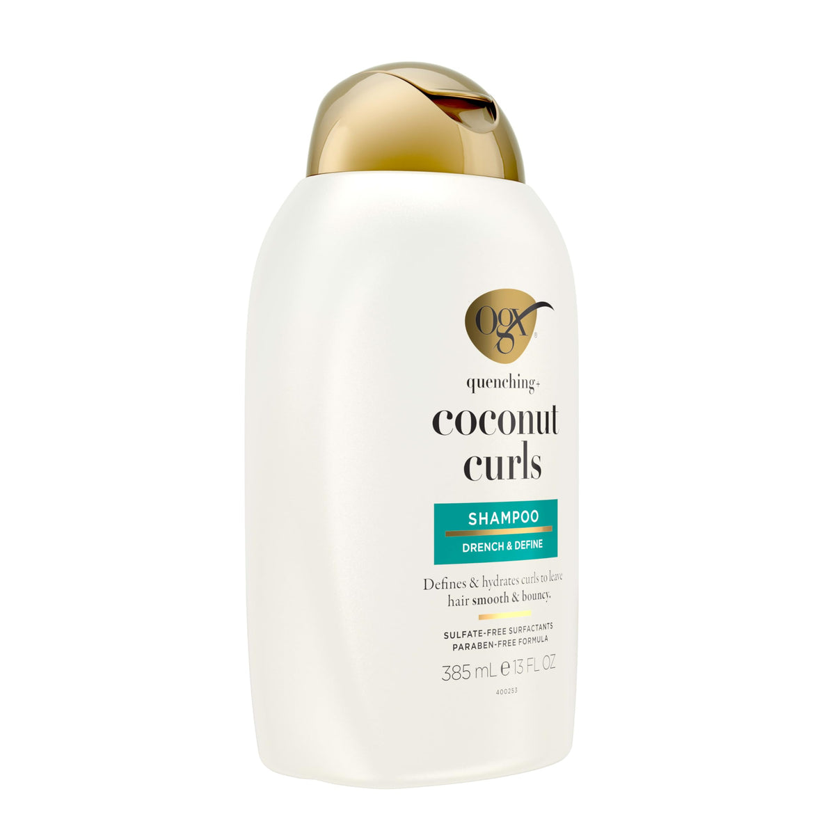 OGX 13 fl oz bottle held in hand to show product scale and convenience