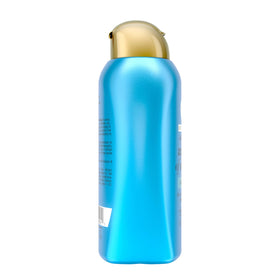 OGX conditioner with argan nuts illustrating cold-pressed argan oil nourishment benefit