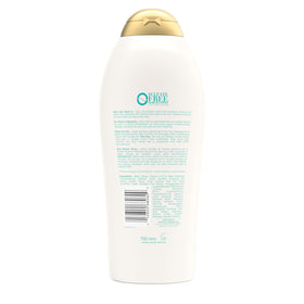 OGX bottle staged in bathroom for lifestyle usage and scent appeal