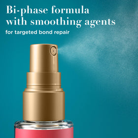 OGX bottle held in hand illustrating compact 1.7 oz travel-friendly size