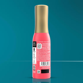 OGX bottle styled on bathroom vanity conveying ready-to-style hair