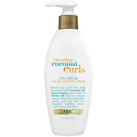 OGX bottle front packaging showing product and scent benefits