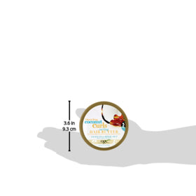 OGX tub next to hand to show 6.6 oz size and travel-friendly benefit