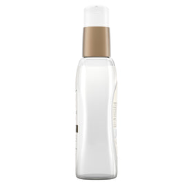 OGX serum being applied to mid-lengths showing smoothing and frizz control benefit