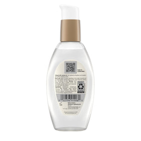 OGX bottle styled on bathroom shelf suggesting everyday use and tropical scent benefit