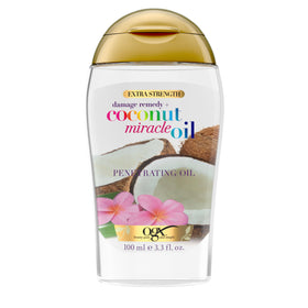 OGX front packaging of coconut miracle oil showing bottle and cap, adds shine