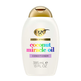 OGX bottle front packaging showing label and benefit for smoother hair
