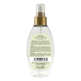 OGX product label close-up showing coconut oil and bamboo extract ingredients