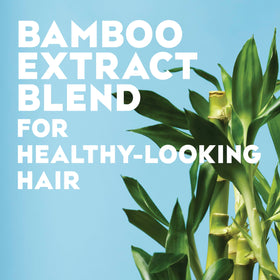 OGX applied to dry hair to smooth frizz and boost shine instantly