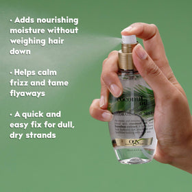 OGX bottle beside a 4 fl oz marker to show compact travel-friendly size