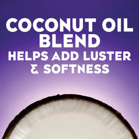 OGX conditioner cream texture closeup, demonstrates rich moisturizing feel