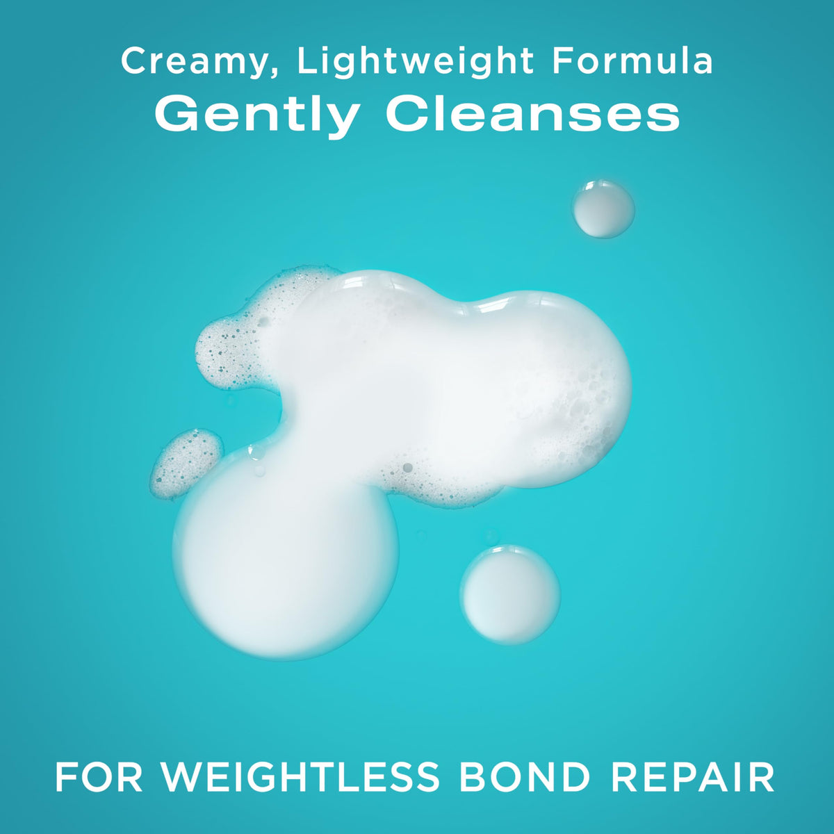 OGX conditioner creamy texture close-up offering hydration and detangling benefit