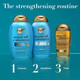 OGX bottle held in hand displaying the 25.4 fl oz salon size