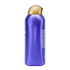 OGX 13 fl oz bottle next to hairbrush showing real size and home use