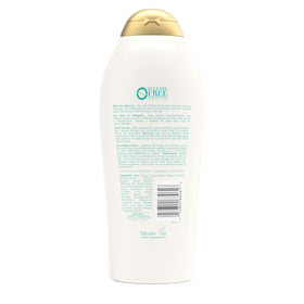 OGX finished curly hair outdoors showing defined, bouncy curls benefit