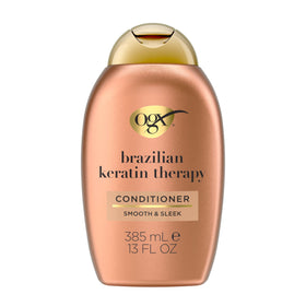 OGX bottle front packaging showing product and benefits