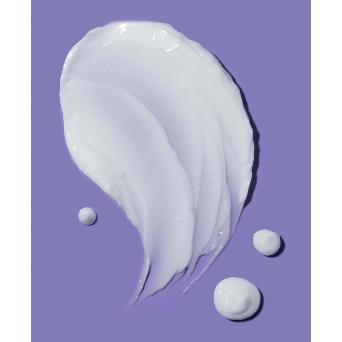 OGX close-up of coconut, vanilla and tiare ingredients highlighting natural scent