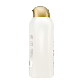 OGX lather on curly hair in shower demonstrating gentle cleansing