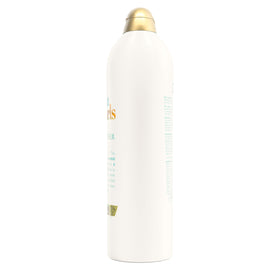 OGX conditioner on bathroom shelf suggesting easy daily routine benefit
