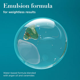 OGX Plump Emulsion droplet on hand highlighting water-based texture for weightless conditioning benefit