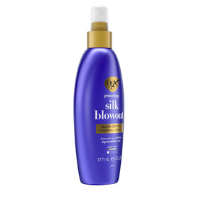 OGX bottle staged on bathroom shelf suggesting staple styling use