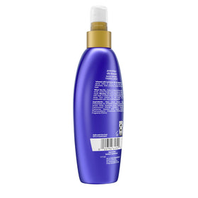 Detail of hair strand after OGX showing soft, frizz-reduced texture