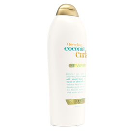 OGX 25.4 fl oz bottle shown next to common household items for scale