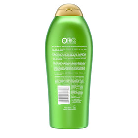 OGX bottle in hand for scale showing large 25.4 fl oz travel-friendly size