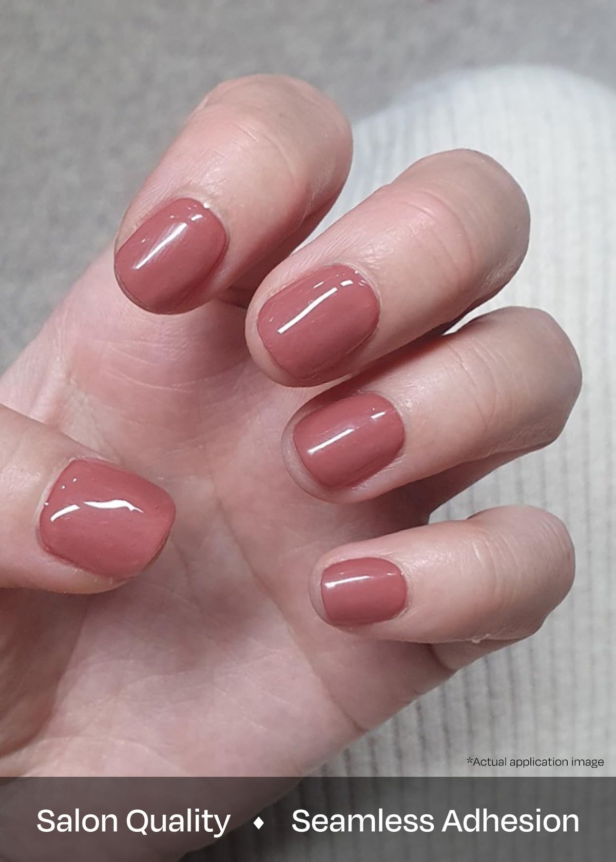 ohora model hands wearing N Cream Rose strips demonstrating polished at-home manicure