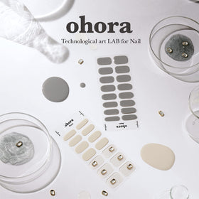 ohora lifestyle image woman typing showing long-lasting nails for everyday use